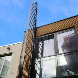 Roof access ladder Black JOMY retractable ladder used for roof access.